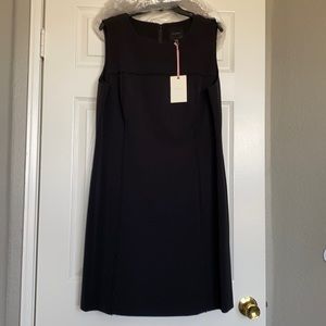 Black beaded shift dress by Alex Marie